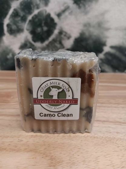 Bar of soap with a label on a wooden surface